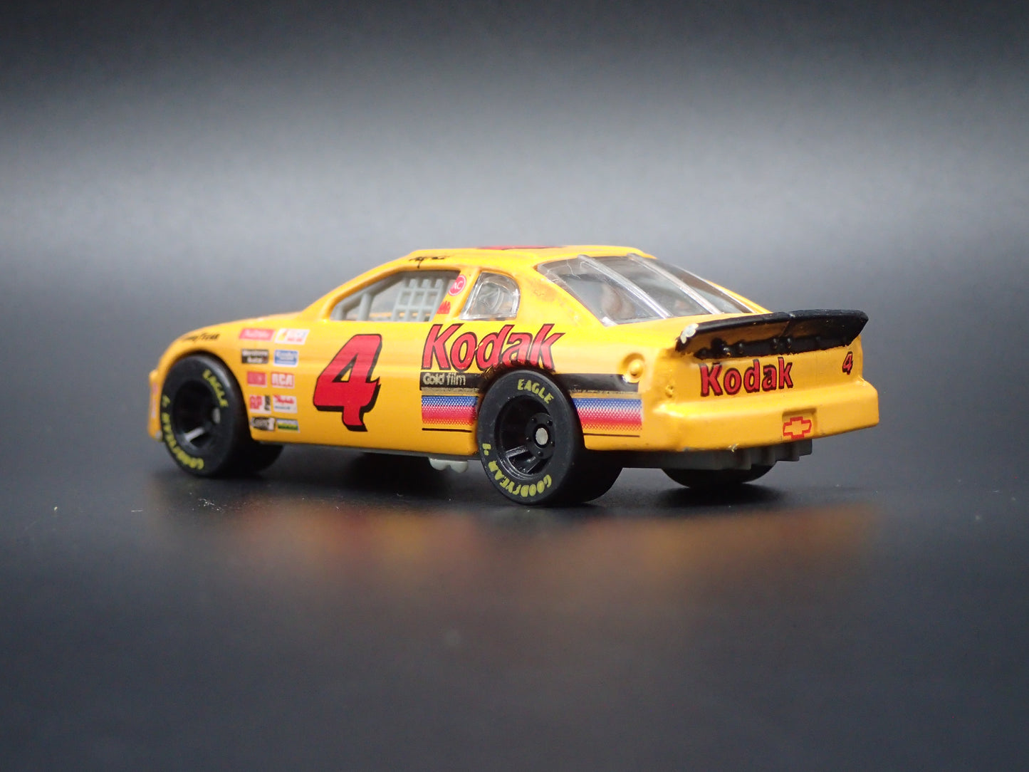 1997 CHEVROLET MONTE CARLO 4 STERLING MARLIN KODAK NASCAR 1:64 SCALE DIECAST CAR