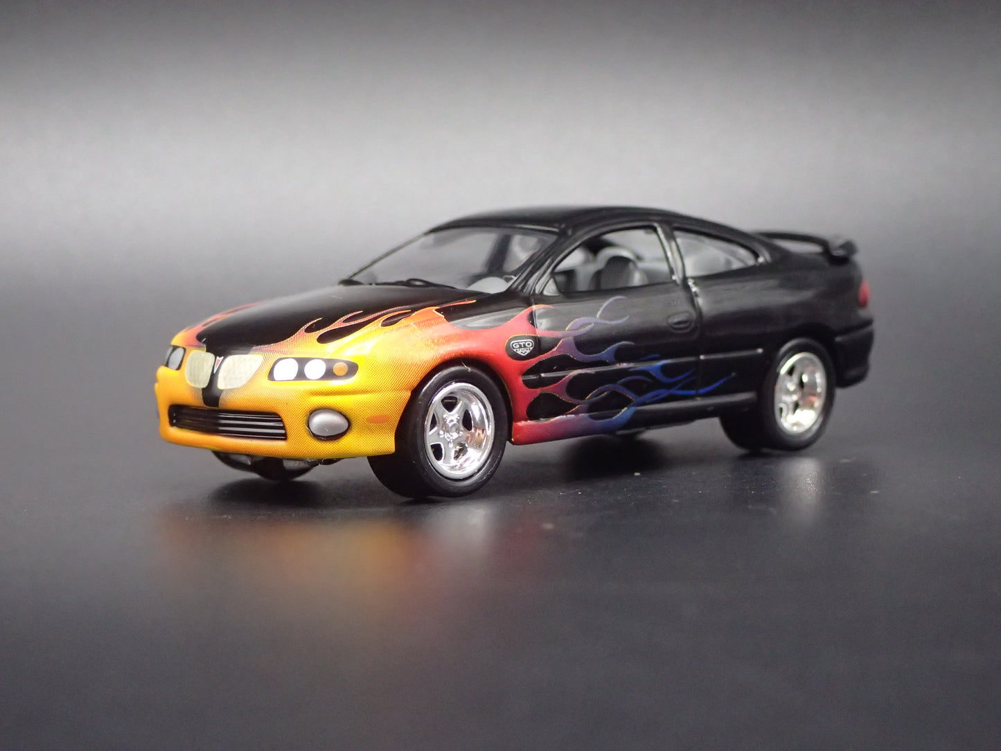 2004-2006 PONTIAC GTO BLACK 1:64 SCALE DIECAST MODEL CAR