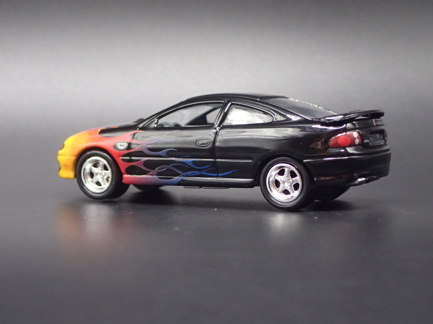 2004-2006 PONTIAC GTO BLACK 1:64 SCALE DIECAST MODEL CAR