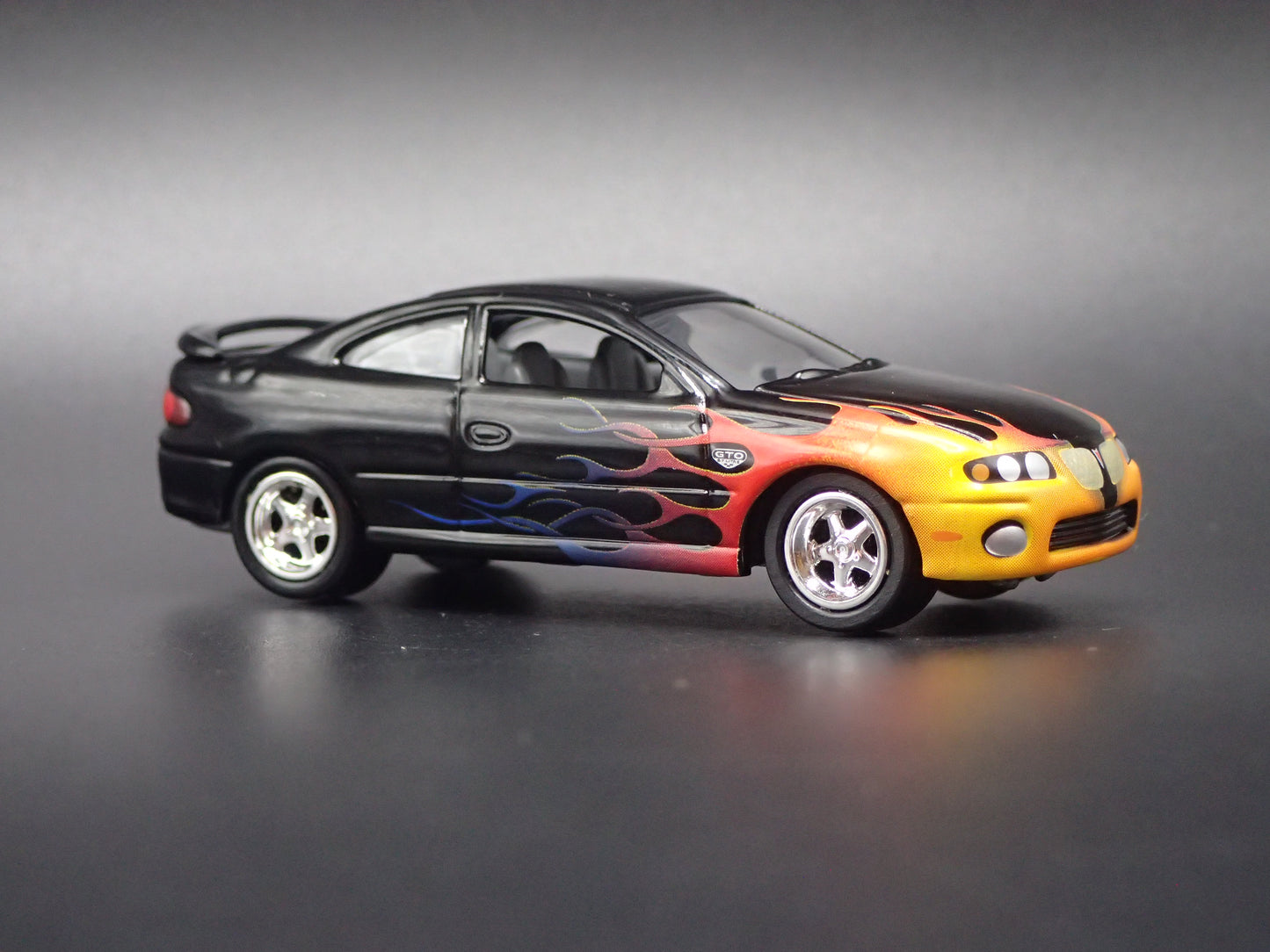 2004-2006 PONTIAC GTO BLACK 1:64 SCALE DIECAST MODEL CAR