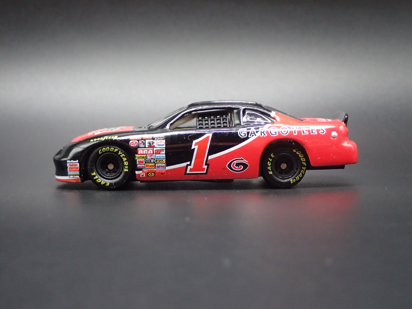 1997 97 PONTIAC GRAND PRIX 1 GARGOYLES 300 NASCAR 1:64 SCALE DIECAST CAR