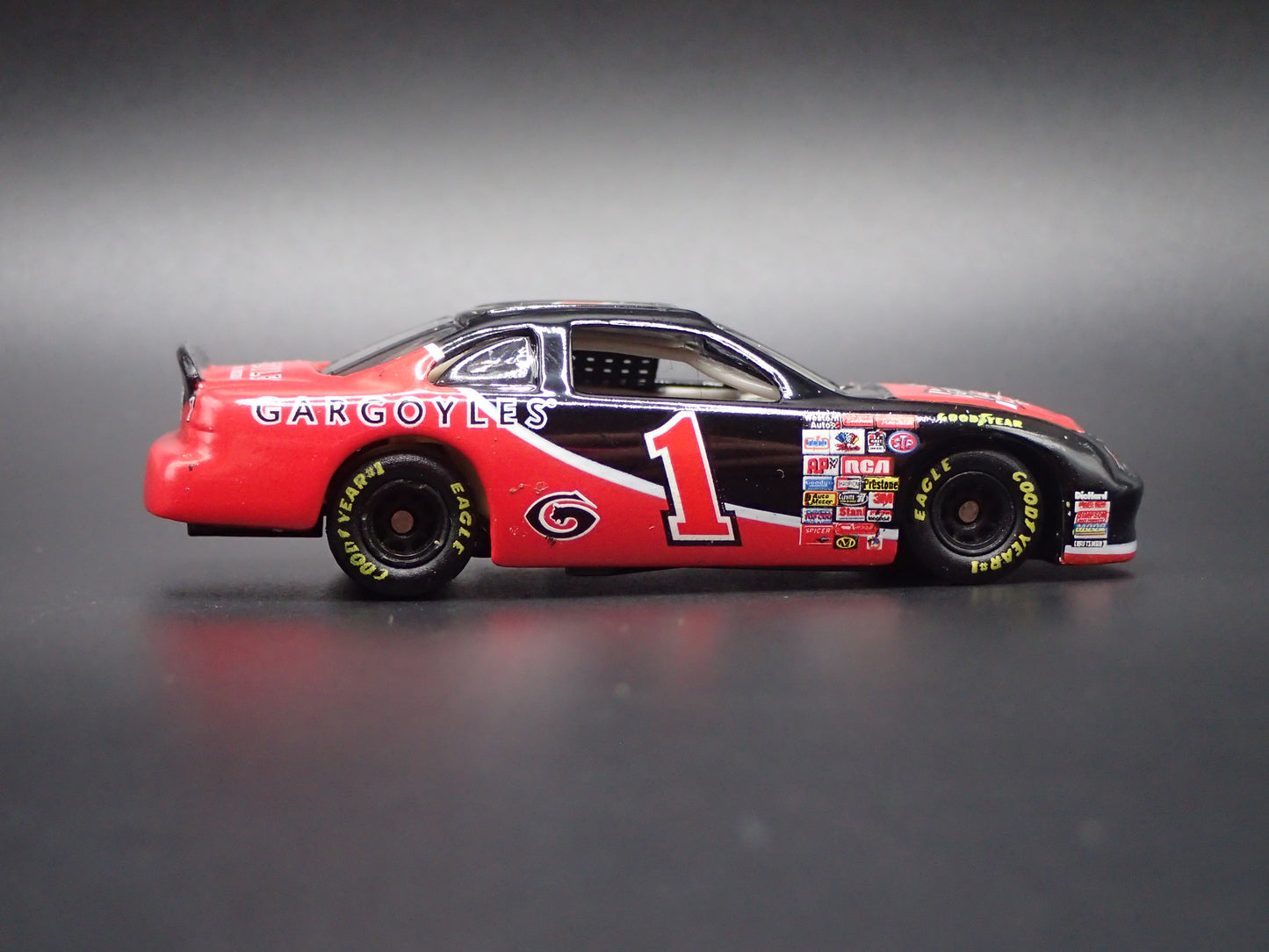 1997 97 PONTIAC GRAND PRIX 1 GARGOYLES 300 NASCAR 1:64 SCALE DIECAST CAR