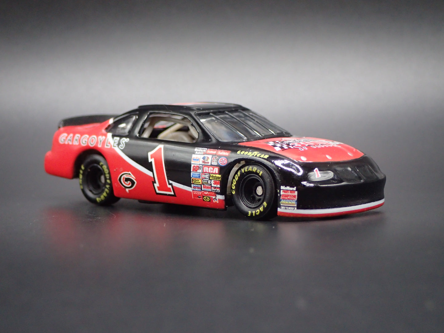 1997 97 PONTIAC GRAND PRIX 1 GARGOYLES 300 NASCAR 1:64 SCALE DIECAST CAR
