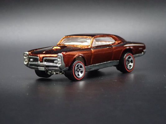 1967 PONTIAC GTO ORANGE 1:64 SCALE LIMITED COLLECTIBLE DIORAMA DIECAST MODEL CAR