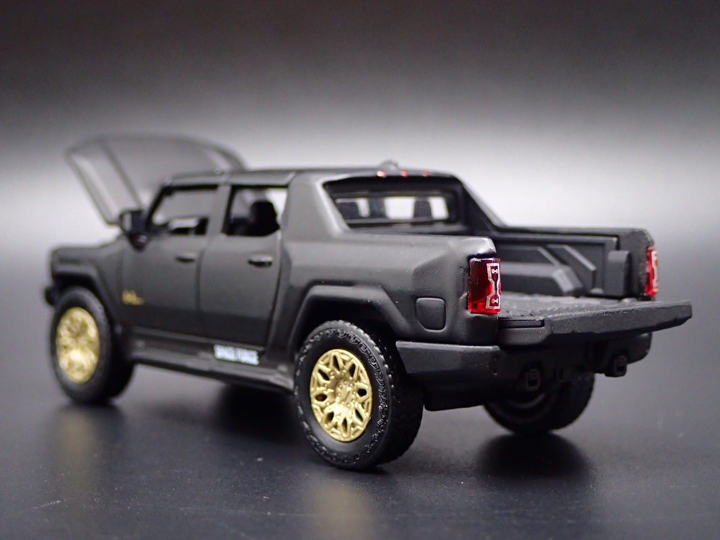 2022-2026 HUMMER EV ELECTRIC TRUCK BLACK SPACE FORCE 1:64 SCALE DIECAST CAR