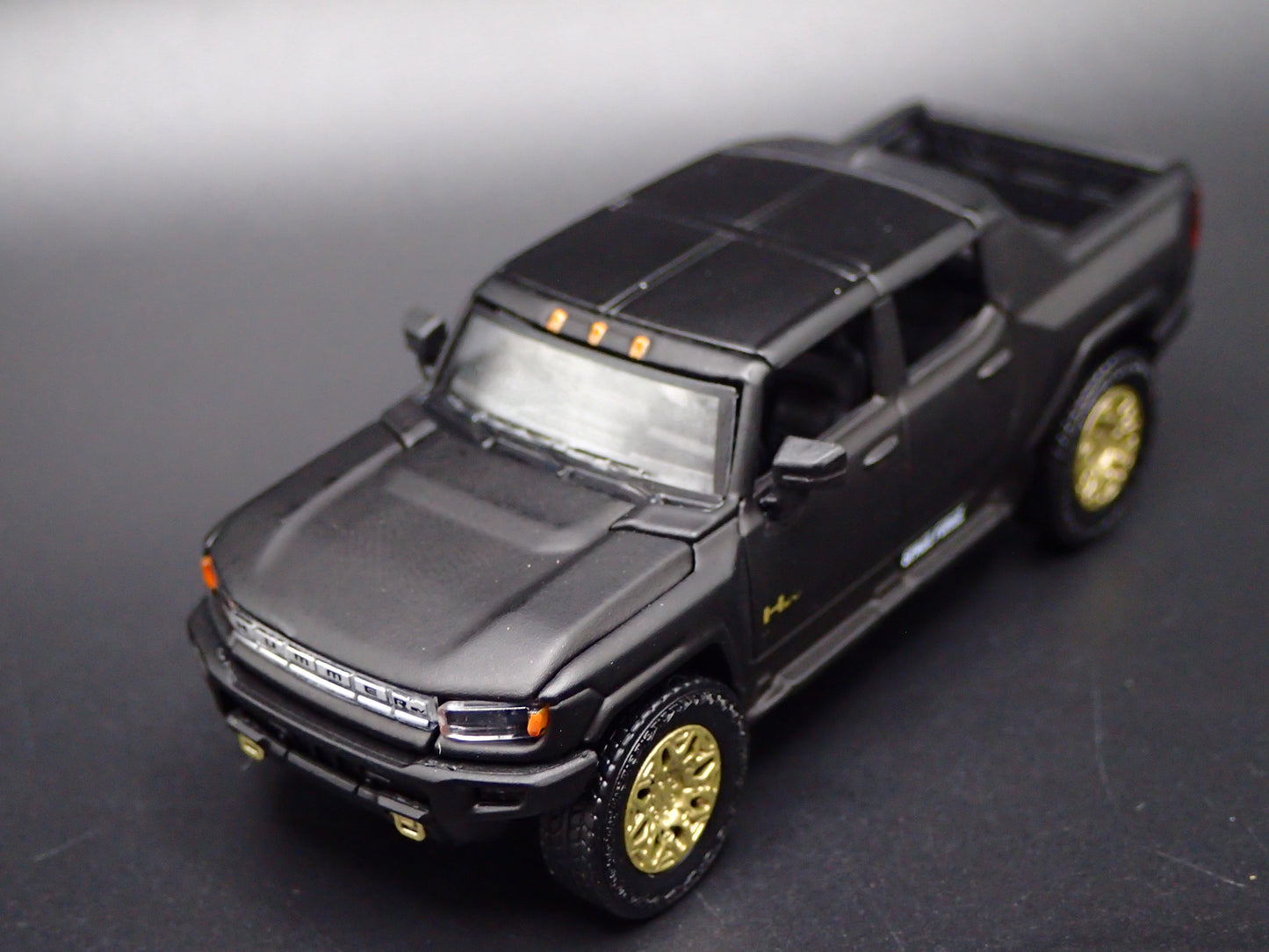 2022-2026 HUMMER EV ELECTRIC TRUCK BLACK SPACE FORCE 1:64 SCALE DIECAST CAR