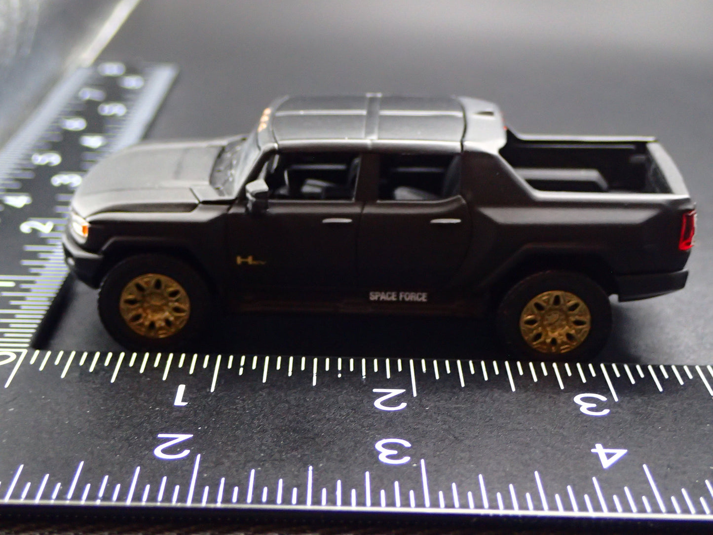 2022-2026 HUMMER EV ELECTRIC TRUCK BLACK SPACE FORCE 1:64 SCALE DIECAST CAR
