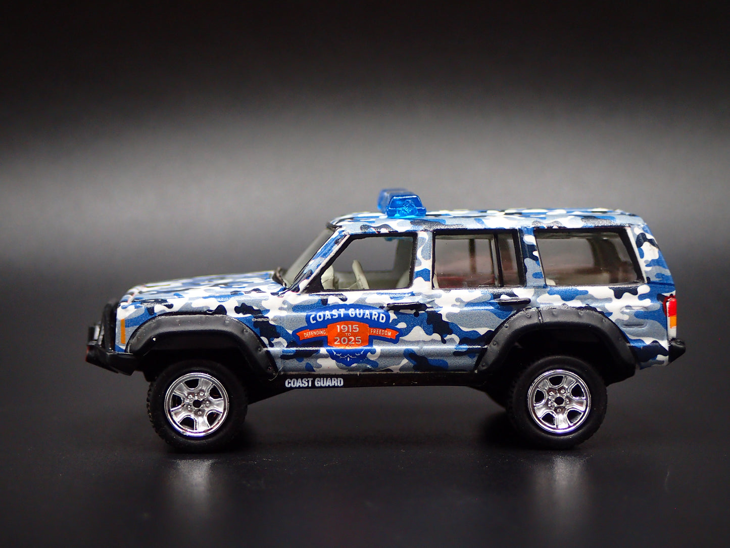 1984-2001 JEEP CHEROKEE XJ COAST GUARD 110 YEARS CAMO 1:64 SCALE DIECAST CAR