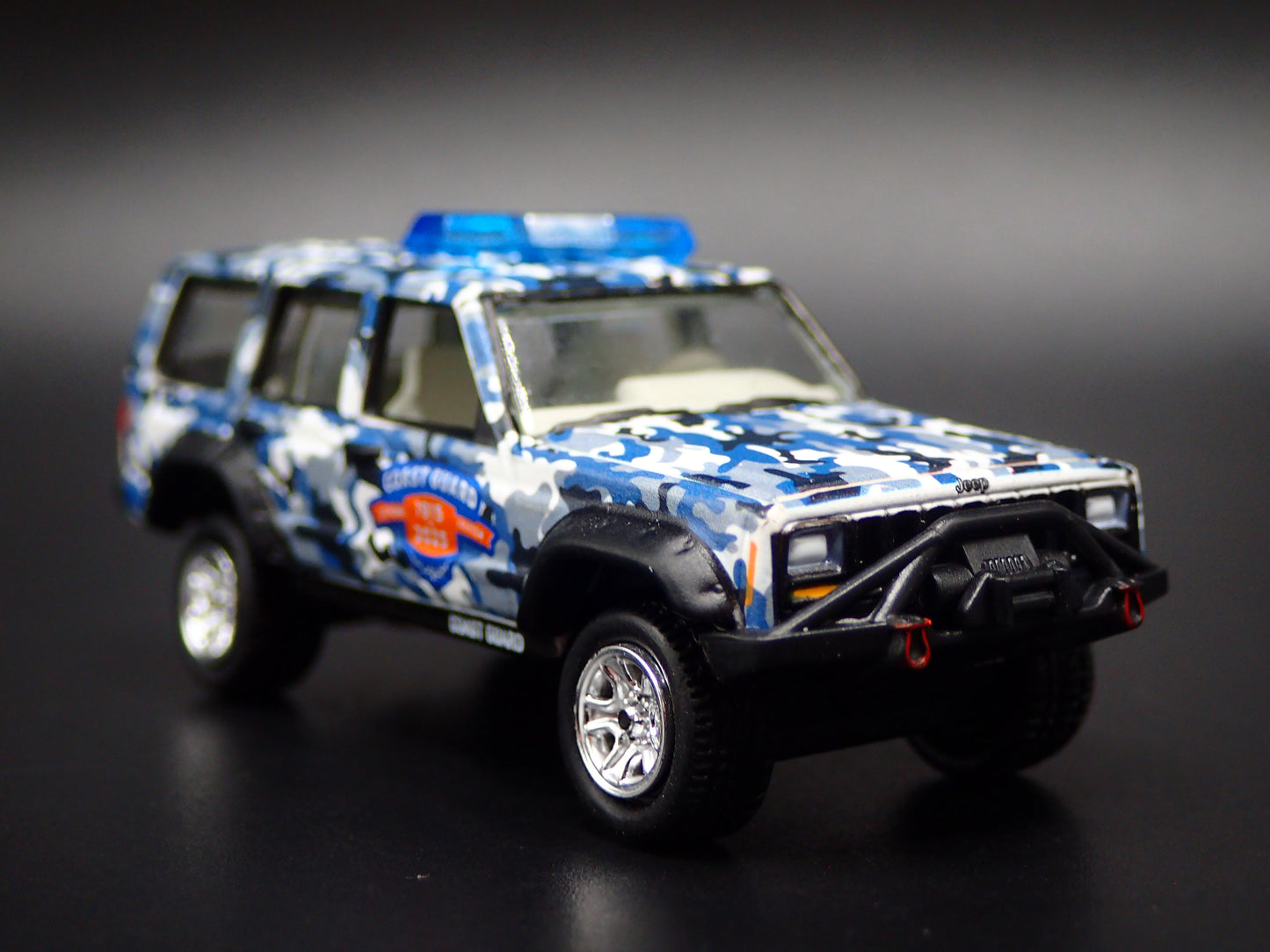 1984-2001 JEEP CHEROKEE XJ COAST GUARD 110 YEARS CAMO 1:64 SCALE DIECAST CAR