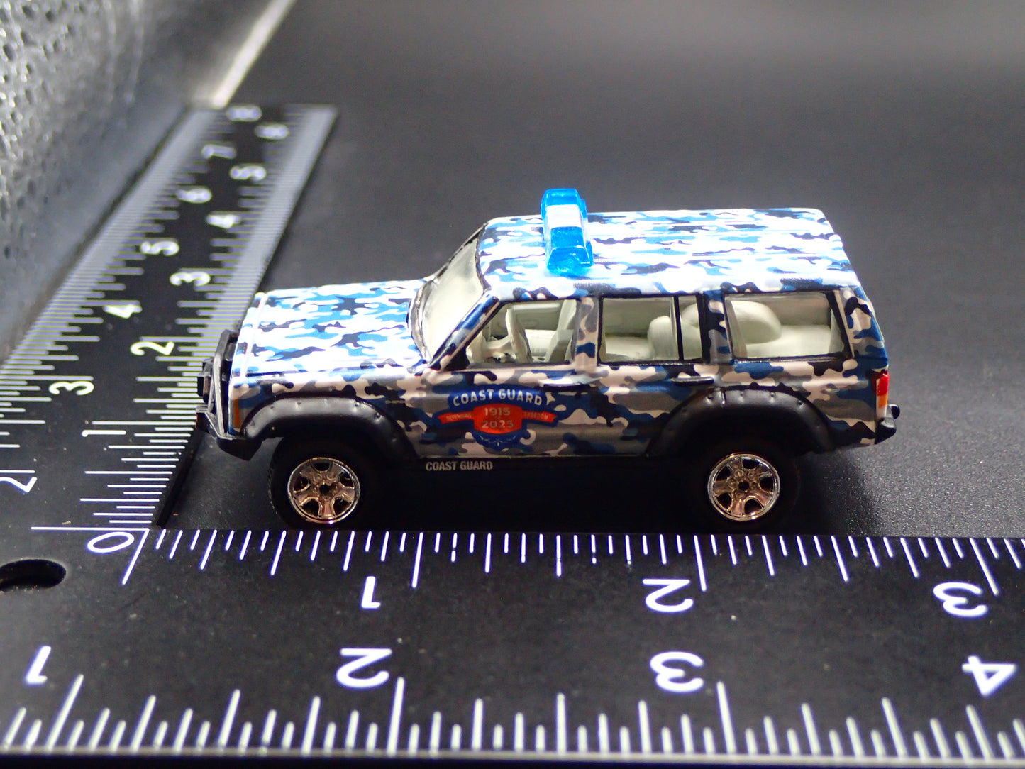 1984-2001 JEEP CHEROKEE XJ COAST GUARD 110 YEARS CAMO 1:64 SCALE DIECAST CAR