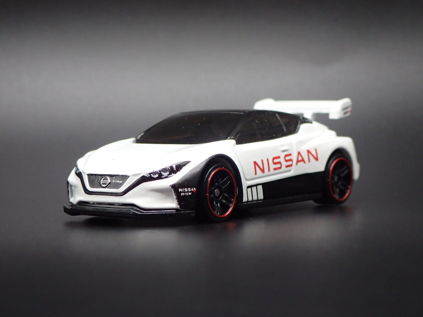 NISSAN LEAF NISMO RC 02 WHITE 1:64 SCALE COLLECTIBLE DIECAST MODEL CAR