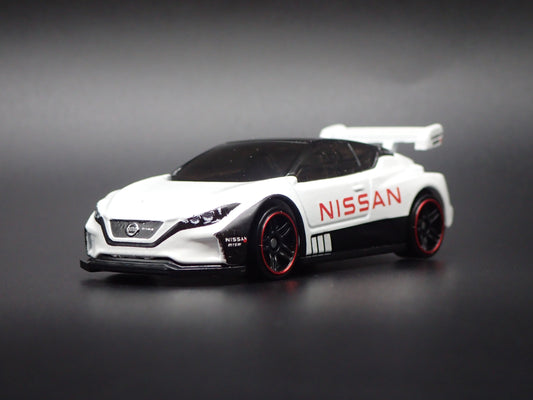 NISSAN LEAF NISMO RC 02 WHITE 1:64 SCALE COLLECTIBLE DIECAST MODEL CAR