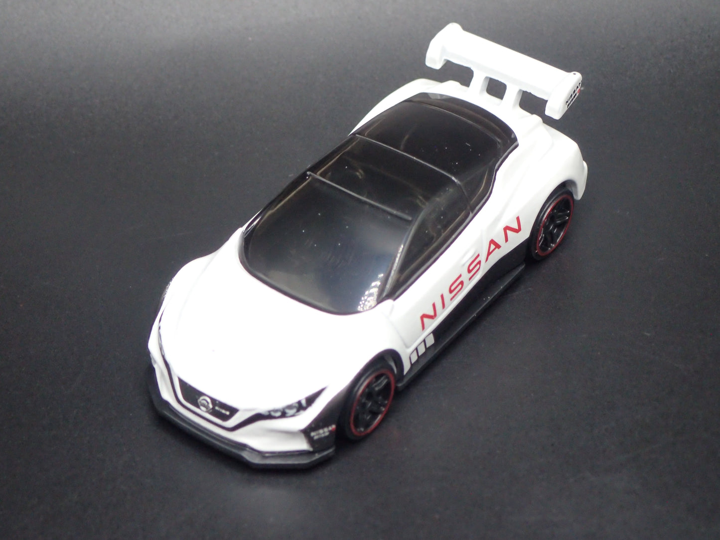 NISSAN LEAF NISMO RC 02 WHITE 1:64 SCALE COLLECTIBLE DIECAST MODEL CAR