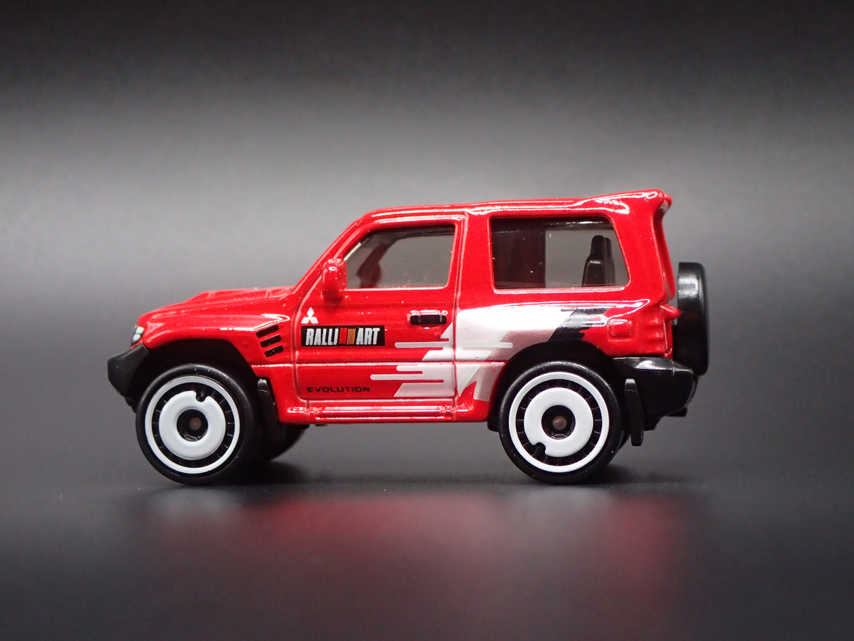 1997-1999 MITSUBISHI PAJERO EVOLUTION SUV RED 1:64 SCALE DIECAST MODEL CAR