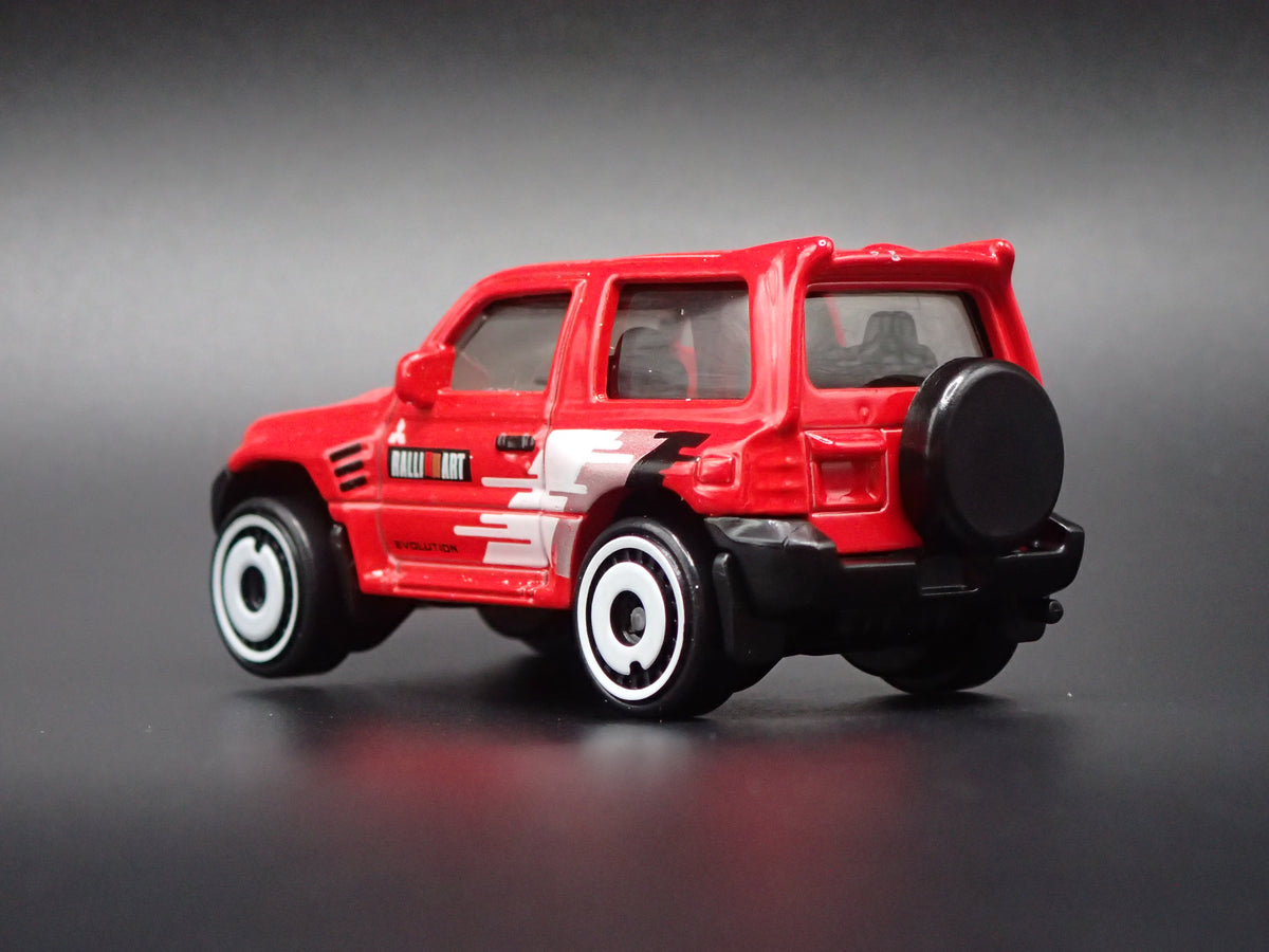 1997-1999 MITSUBISHI PAJERO EVOLUTION SUV RED 1:64 SCALE DIECAST MODEL CAR