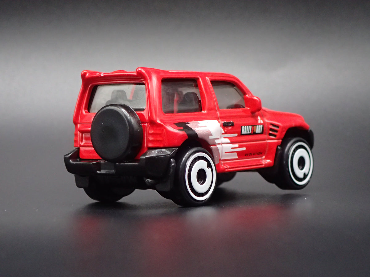 1997-1999 MITSUBISHI PAJERO EVOLUTION SUV RED 1:64 SCALE DIECAST MODEL CAR