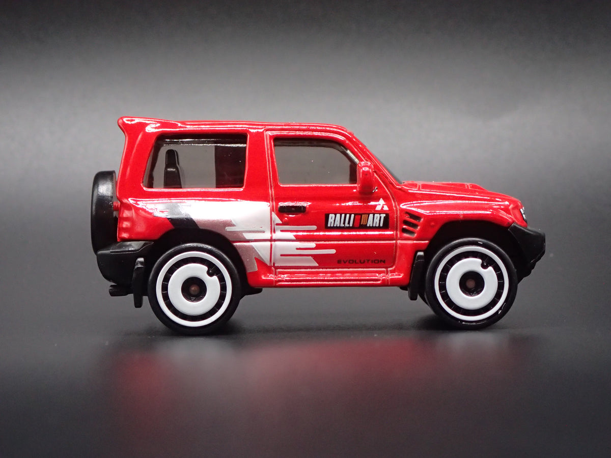 1997-1999 MITSUBISHI PAJERO EVOLUTION SUV RED 1:64 SCALE DIECAST MODEL CAR