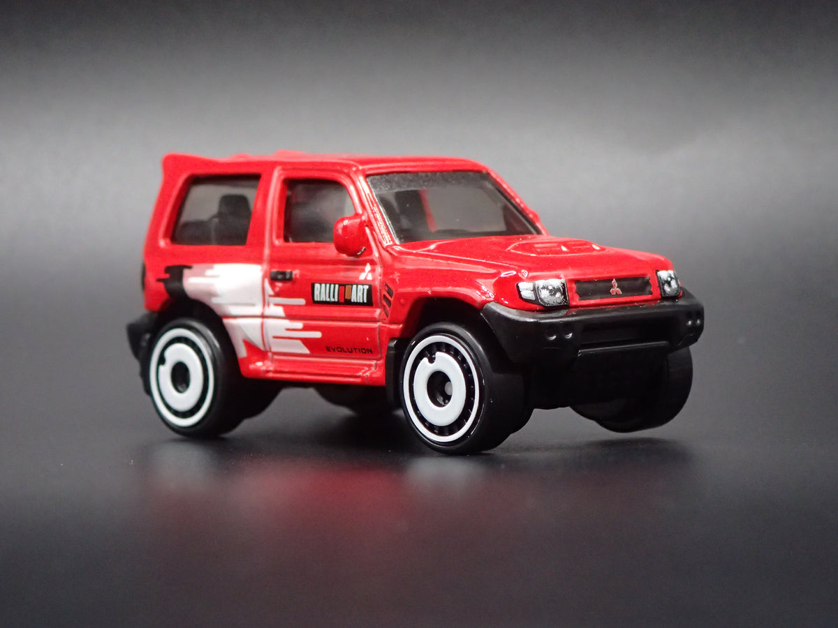 1997-1999 MITSUBISHI PAJERO EVOLUTION SUV RED 1:64 SCALE DIECAST MODEL CAR