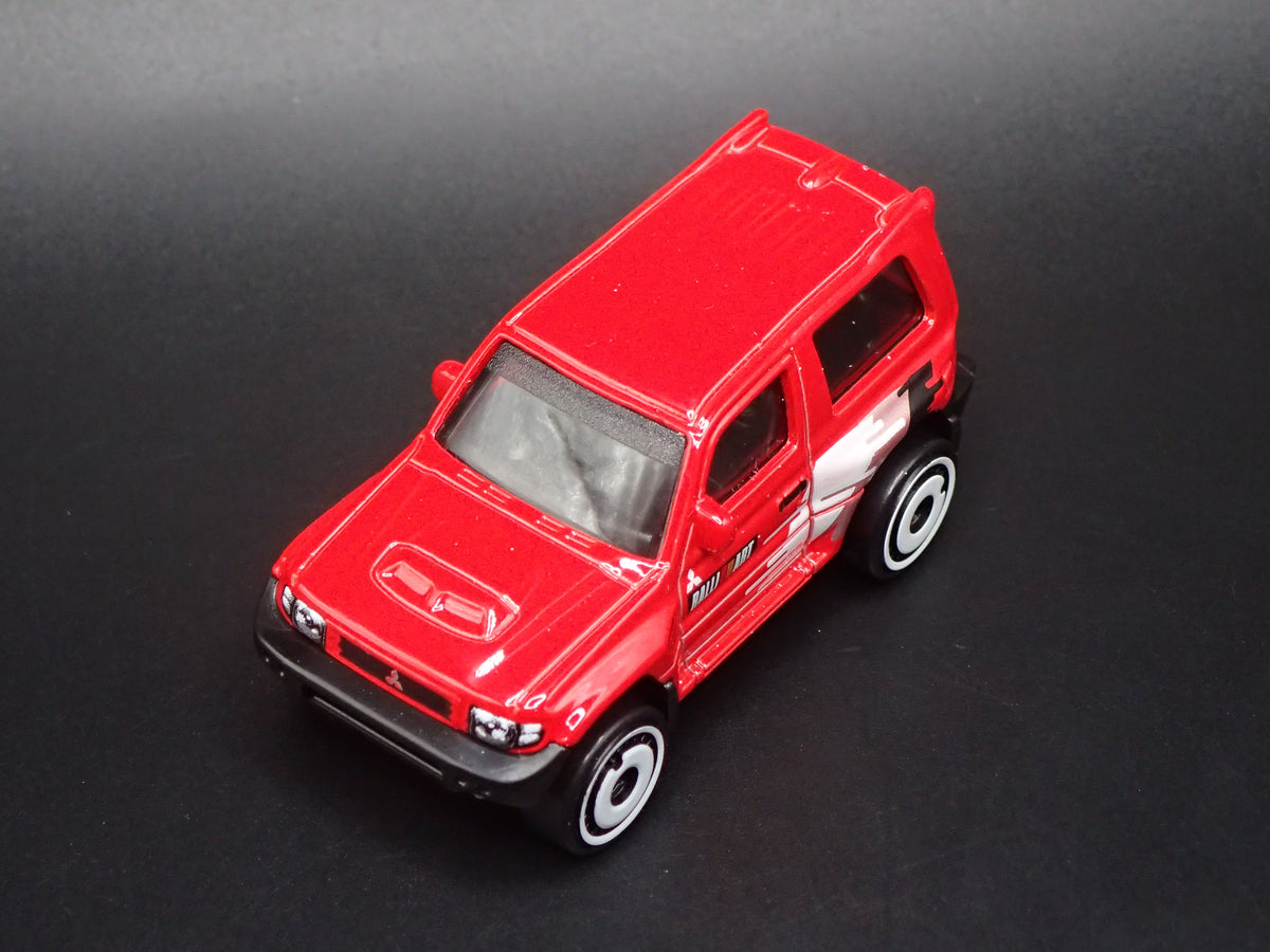 1997-1999 MITSUBISHI PAJERO EVOLUTION SUV RED 1:64 SCALE DIECAST MODEL CAR