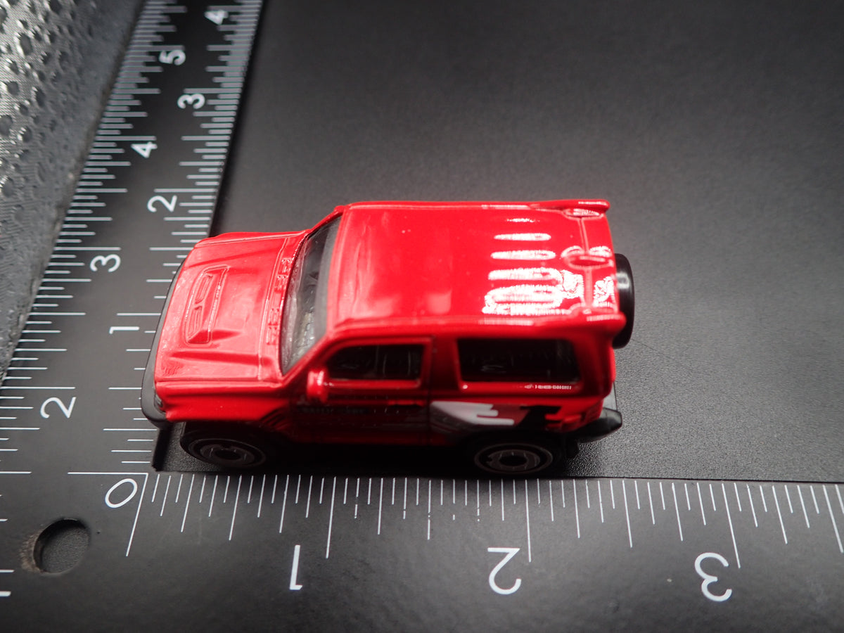 1997-1999 MITSUBISHI PAJERO EVOLUTION SUV RED 1:64 SCALE DIECAST MODEL CAR