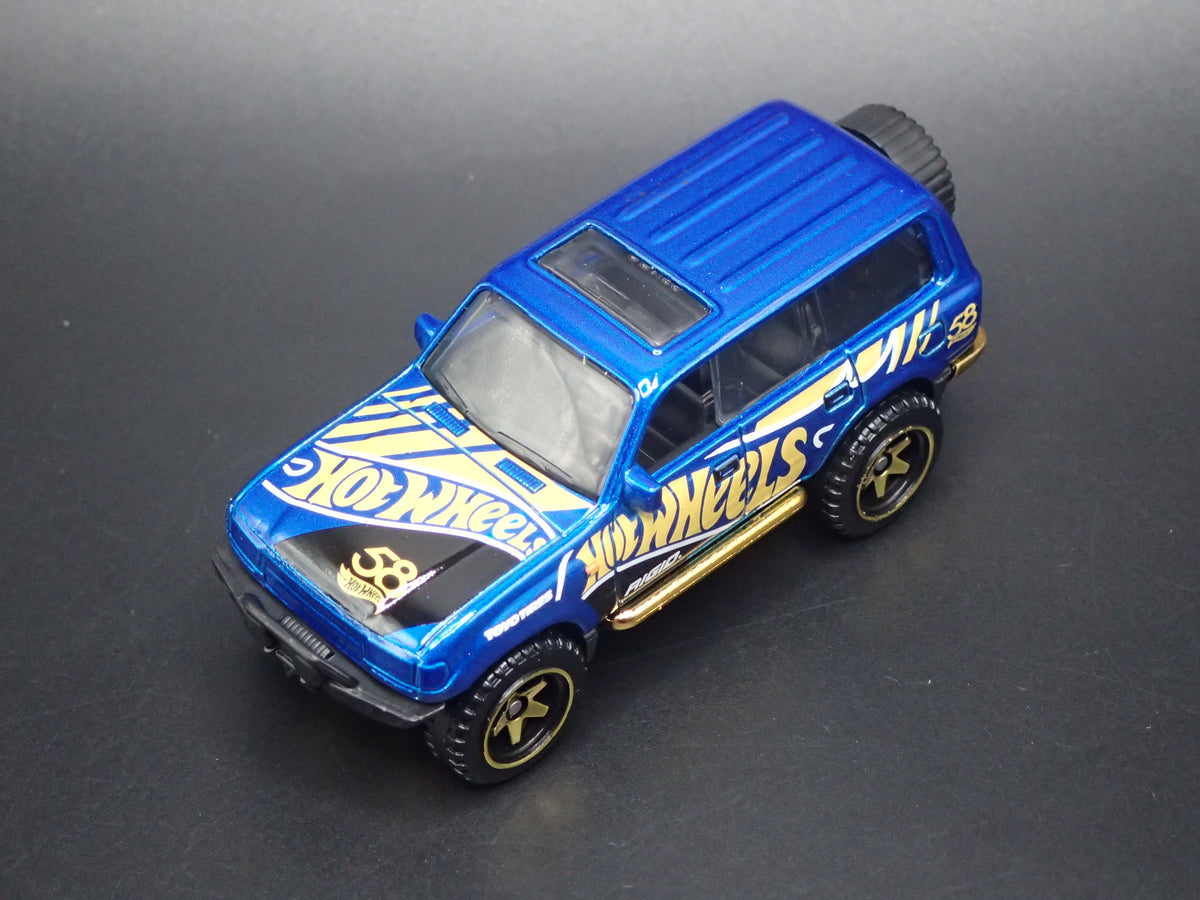 1990-1998 TOYOTA LAND CRUISER 80 BLUE 1/64 SCALE DIORAMA DIECAST MODEL CAR