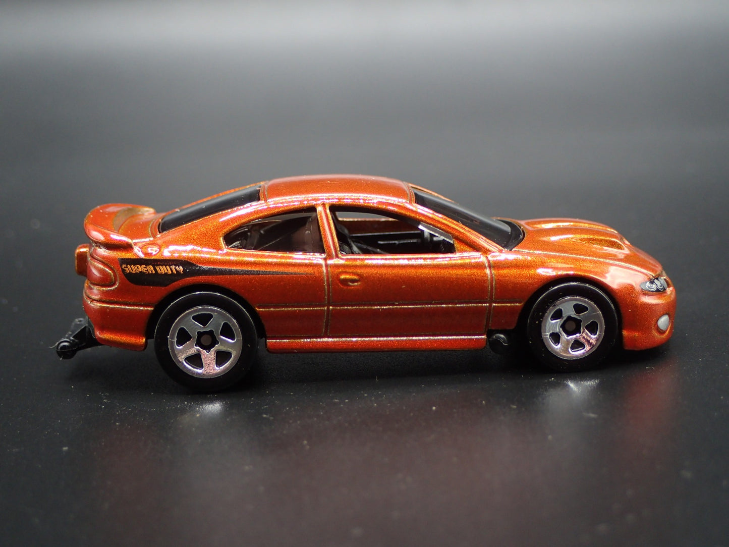 2004-2006 PONTIAC GTO ORANGE 1:64 SCALE COLLECTIBLE DIORAMA DIECAST MODEL CAR