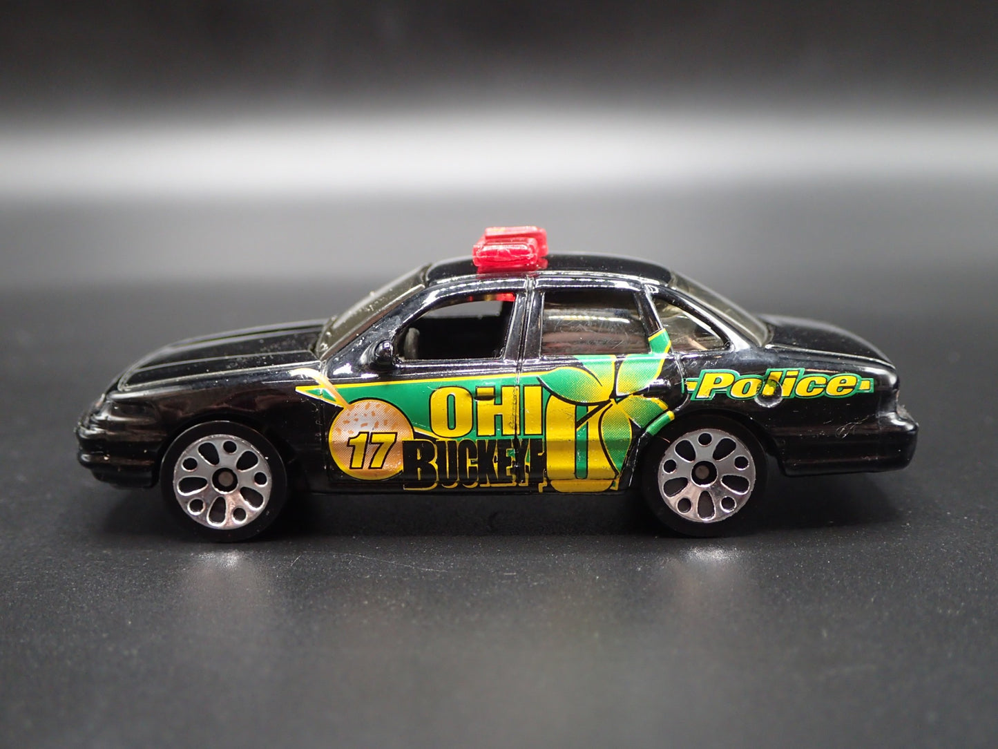 1992 - 1997 FORD CROWN VICTORIA OHIO BUCKEYES BLACK 1:64 SCALE DIECAST MODEL CAR