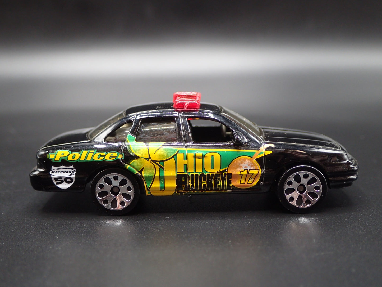 1992 - 1997 FORD CROWN VICTORIA OHIO BUCKEYES BLACK 1:64 SCALE DIECAST MODEL CAR