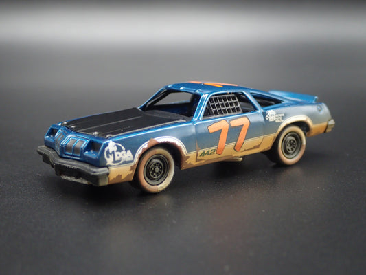 1977 77 OLDS OLDSMOBILE CUTLASS DEMOLITION DERBY 1/64 SCALE DIECAST MODEL CAR-Burning Rubber Toy Company