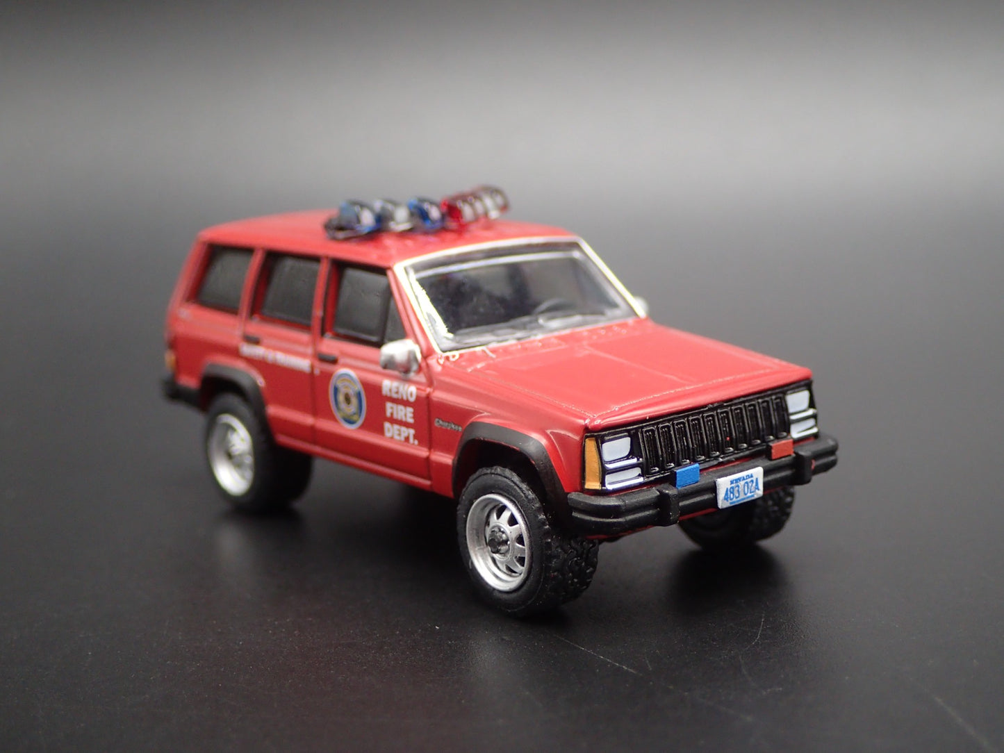 1990 JEEP CHEROKEE XJ RENO, NEVADA FIRE DEPARTMENT 1:64 SCALE DIECAST MODEL CAR