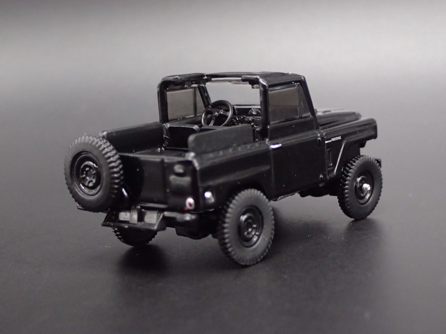 1960-1980 NISSAN PATROL SUV TRUCK BLACK 1:64 SCALE DIORAMA DIECAST MODEL CAR