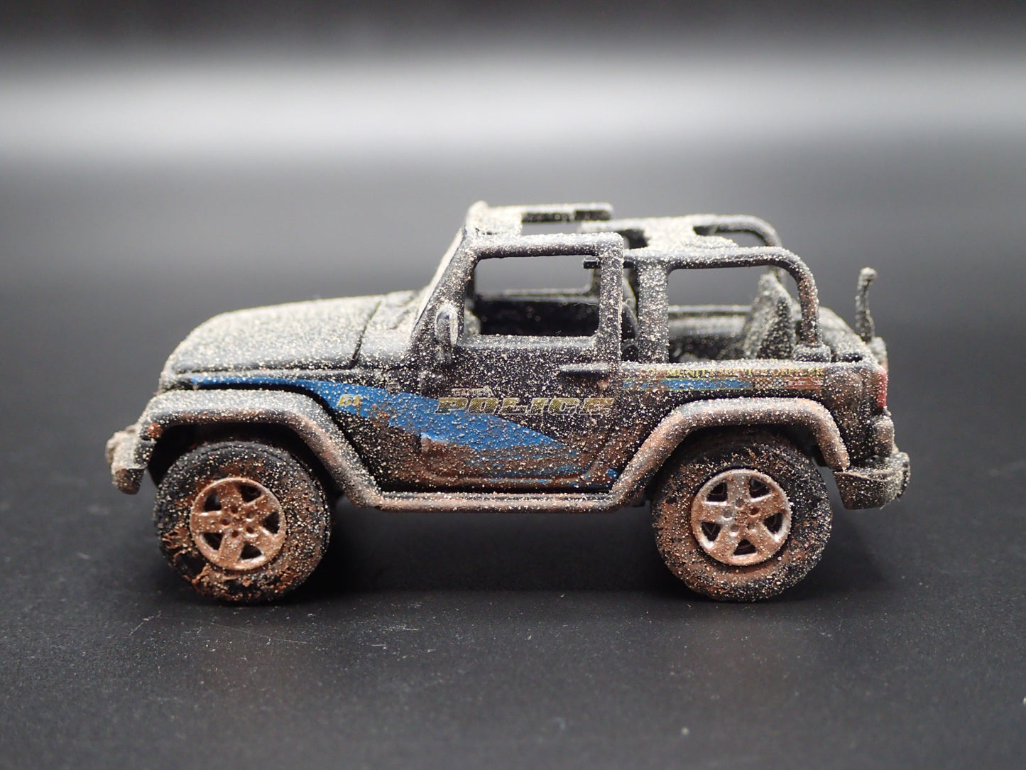 2012 12 JEEP WRANGLER GENEVA IL POLICE DEPT MUDDY 1/64 SCALE DIECAST MODEL CAR