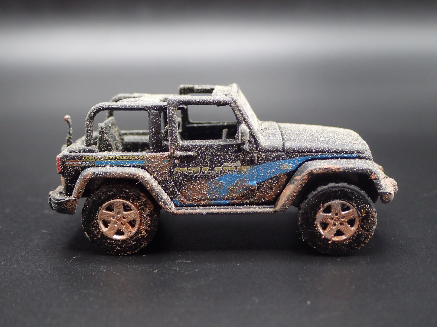 2012 12 JEEP WRANGLER GENEVA IL POLICE DEPT MUDDY 1/64 SCALE DIECAST MODEL CAR