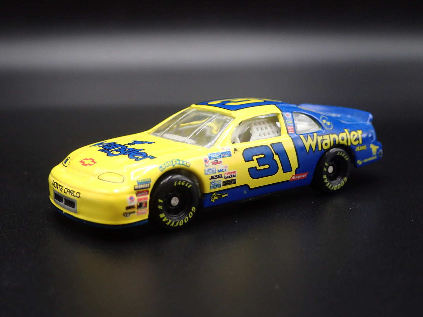 1997 CHEVY CHEVROLET MONTE CARLO WRANGLER JR NASCAR 1:64 SCALE DIECAST MODEL CAR