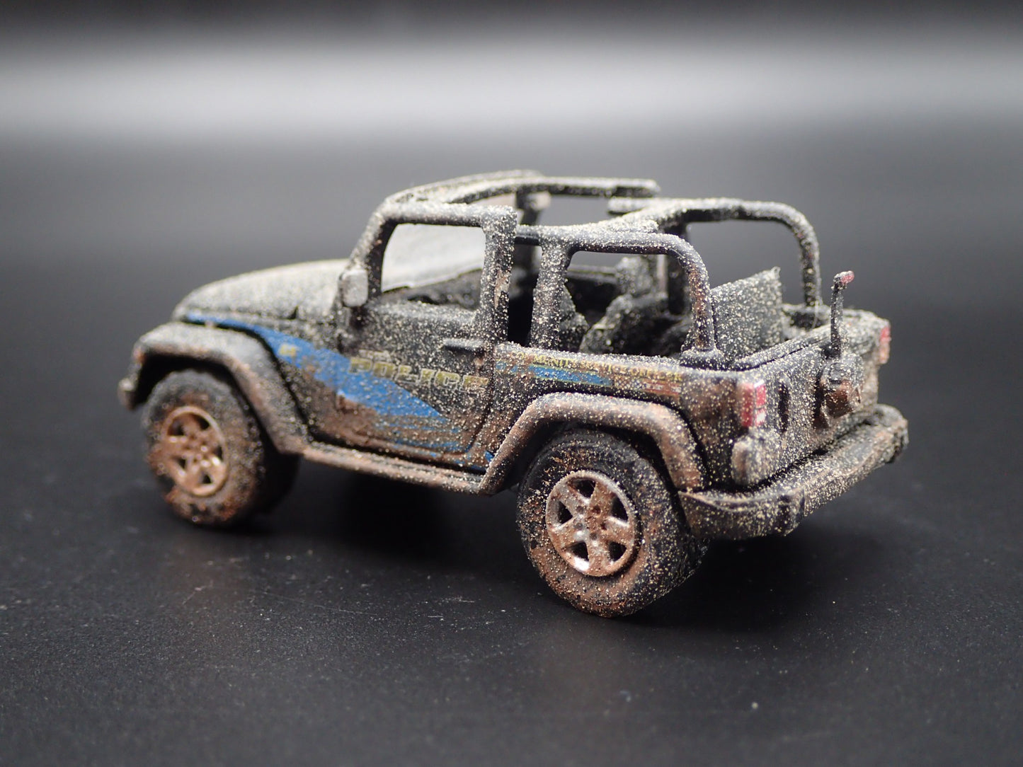 2012 12 JEEP WRANGLER GENEVA IL POLICE DEPT MUDDY 1/64 SCALE DIECAST MODEL CAR