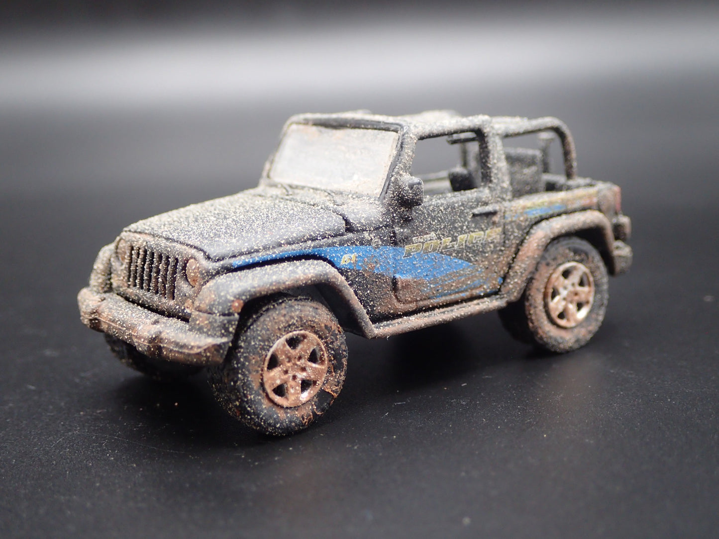 2012 12 JEEP WRANGLER GENEVA IL POLICE DEPT MUDDY 1/64 SCALE DIECAST MODEL CAR