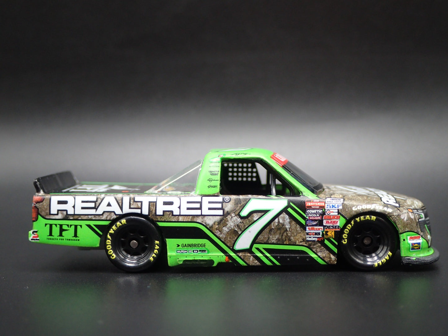 2024 CHEVY SILVERADO 7 KYLE BUSCH REALTREE TEXAS NASCAR TRUCK 1:64 DIECAST CAR