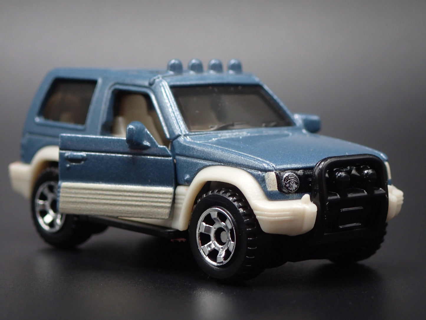 1991-1998 MITSUBISHI PAJERO SUV 1:64 SCALE COLLECTIBLE DIORAMA DIECAST MODEL CAR