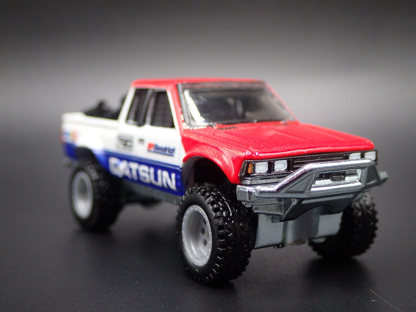 DATSUN PICKUP TRUCK BFGOODRICH 4X4 OFF ROAD TROPHY 1:64 SCALE DIECAST MODEL CAR
