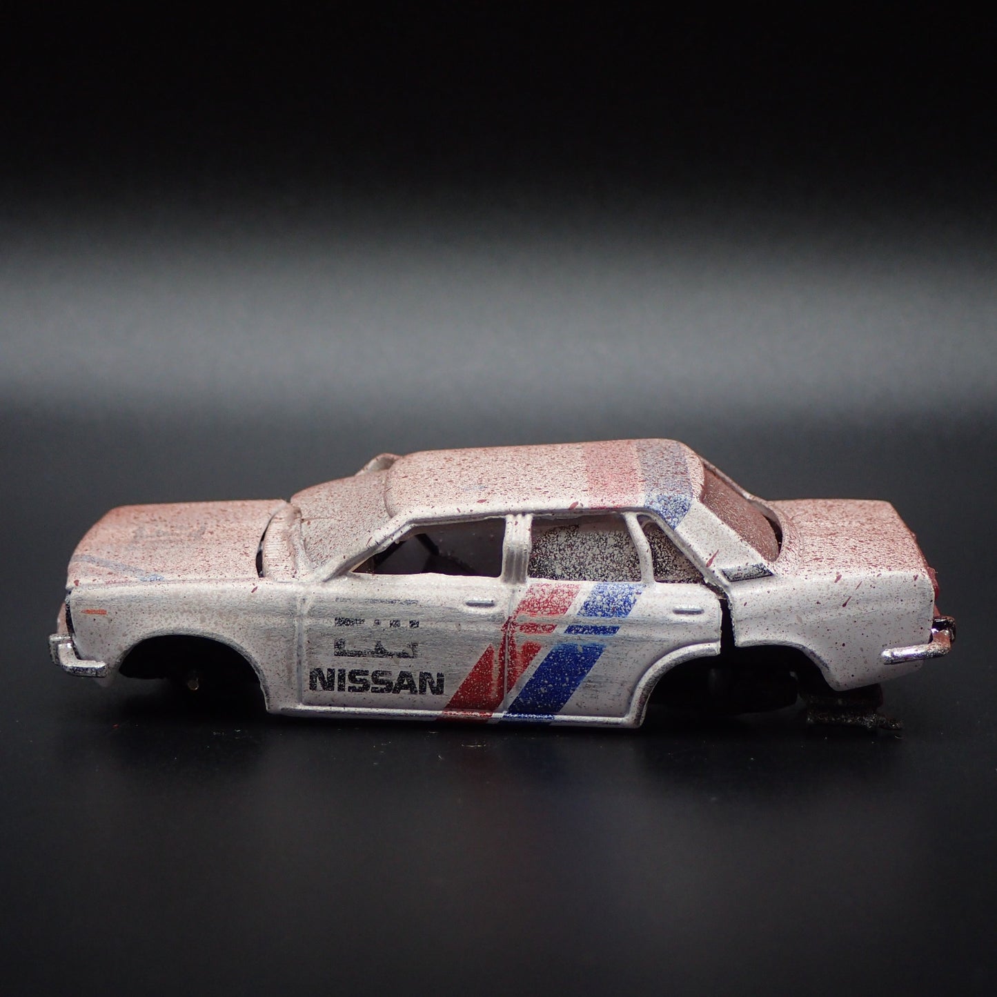 1967-1973 DATSUN BLUEBIRD 1600 SSS FOUR DOOR WRECKED 1:64 DIECAST MODEL CAR