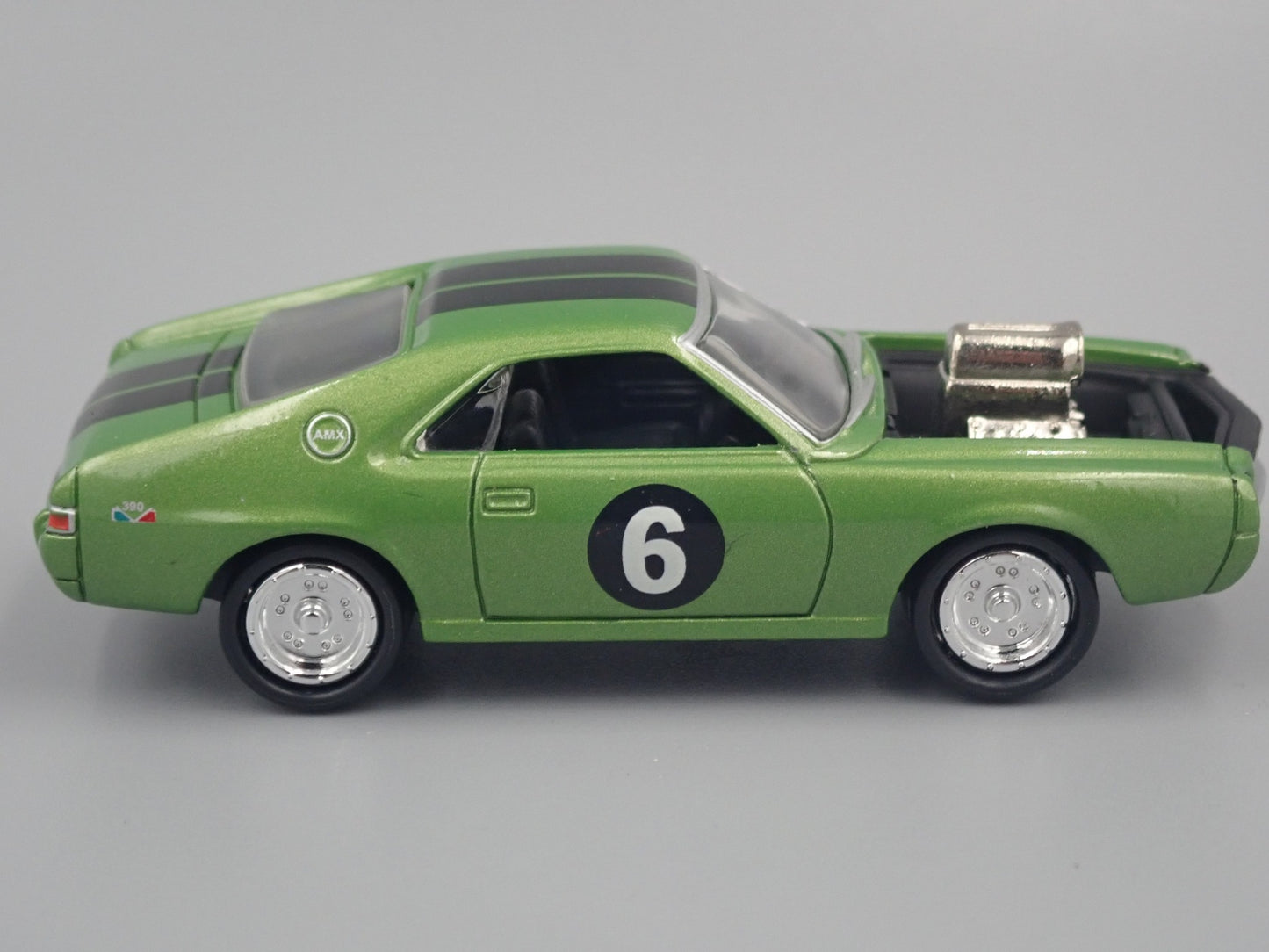 1969 AMC AMX GREEN 1:64 SCALE COLLECTIBLE DIORAMA DIECAST MODEL CAR