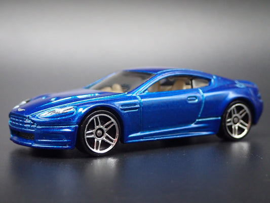 2008-2012 ASTON MARTIN DBS BLUE 1/64 SCALE COLLECTIBLE DIORAMA DIECAST MODEL CAR