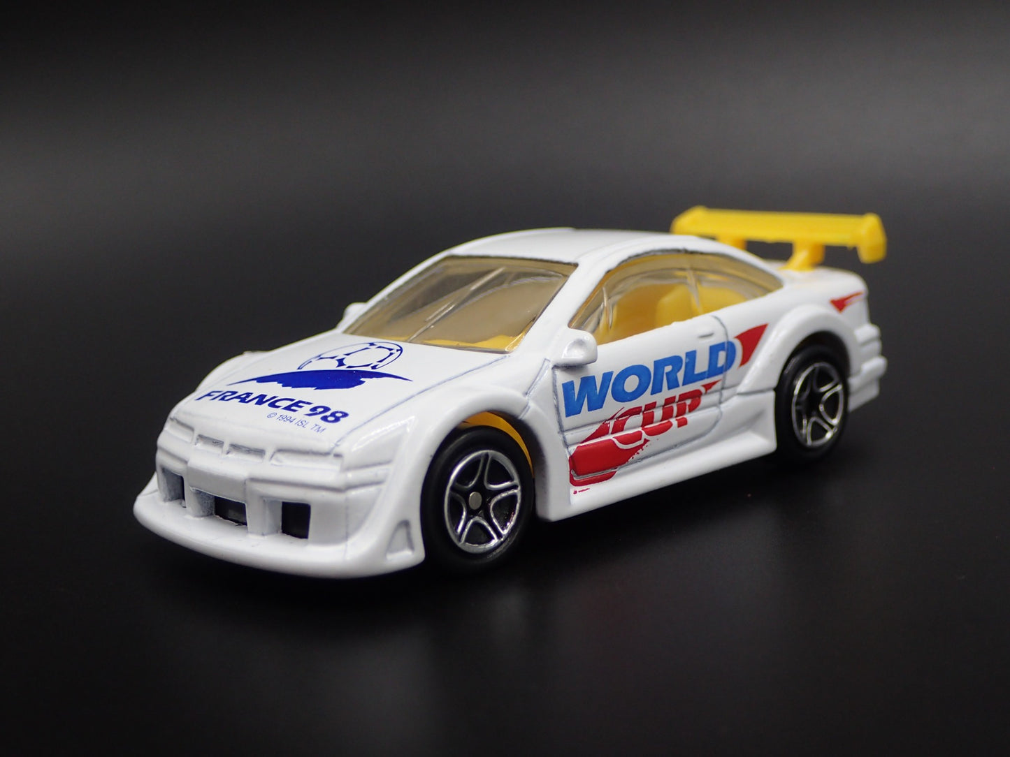 1989-1997 OPEL CALIBRA WORLD CUP FRANCE 1:64 SCALE DIORAMA DIECAST MODEL CAR