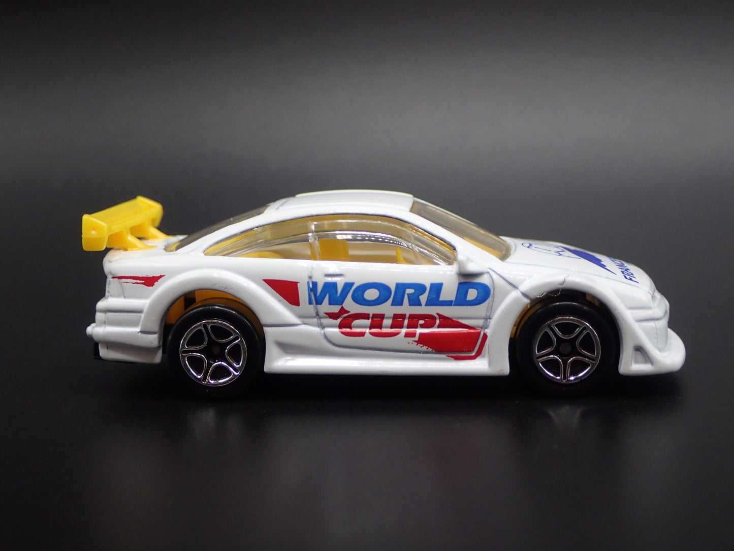 1989-1997 OPEL CALIBRA WORLD CUP FRANCE 1:64 SCALE DIORAMA DIECAST MODEL CAR