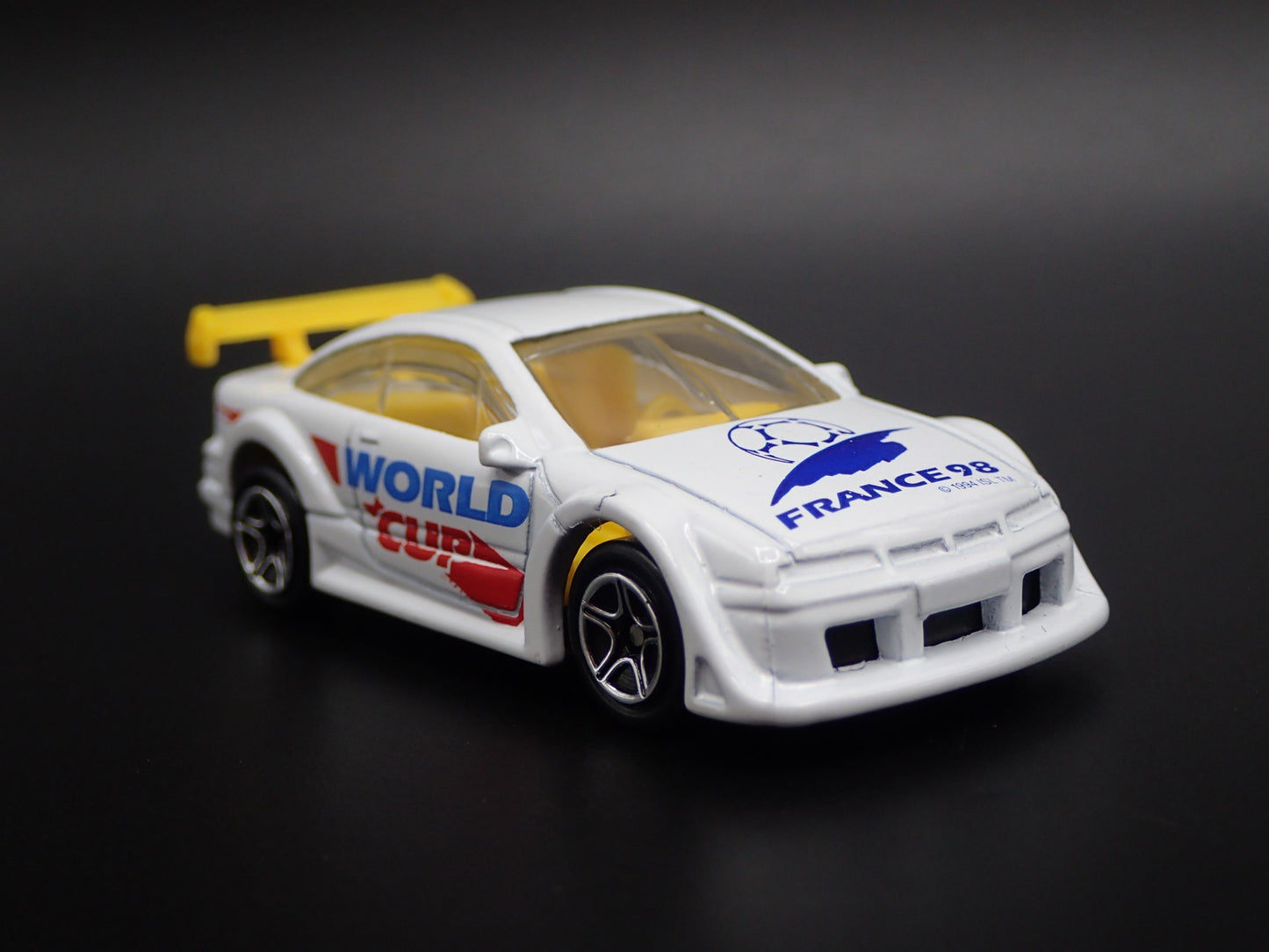 1989-1997 OPEL CALIBRA WORLD CUP FRANCE 1:64 SCALE DIORAMA DIECAST MODEL CAR