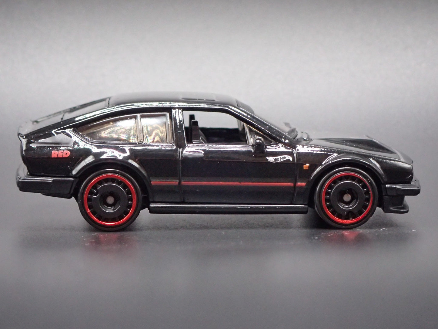 1981-1987 ALFA ROMEO GTV6 3.0 BLACK 1:64 SCALE COLLECTIBLE DIECAST MODEL CAR