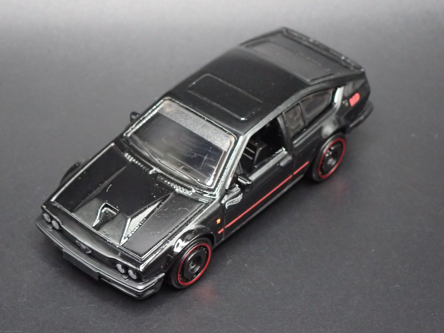 1981-1987 ALFA ROMEO GTV6 3.0 BLACK 1:64 SCALE COLLECTIBLE DIECAST MODEL CAR