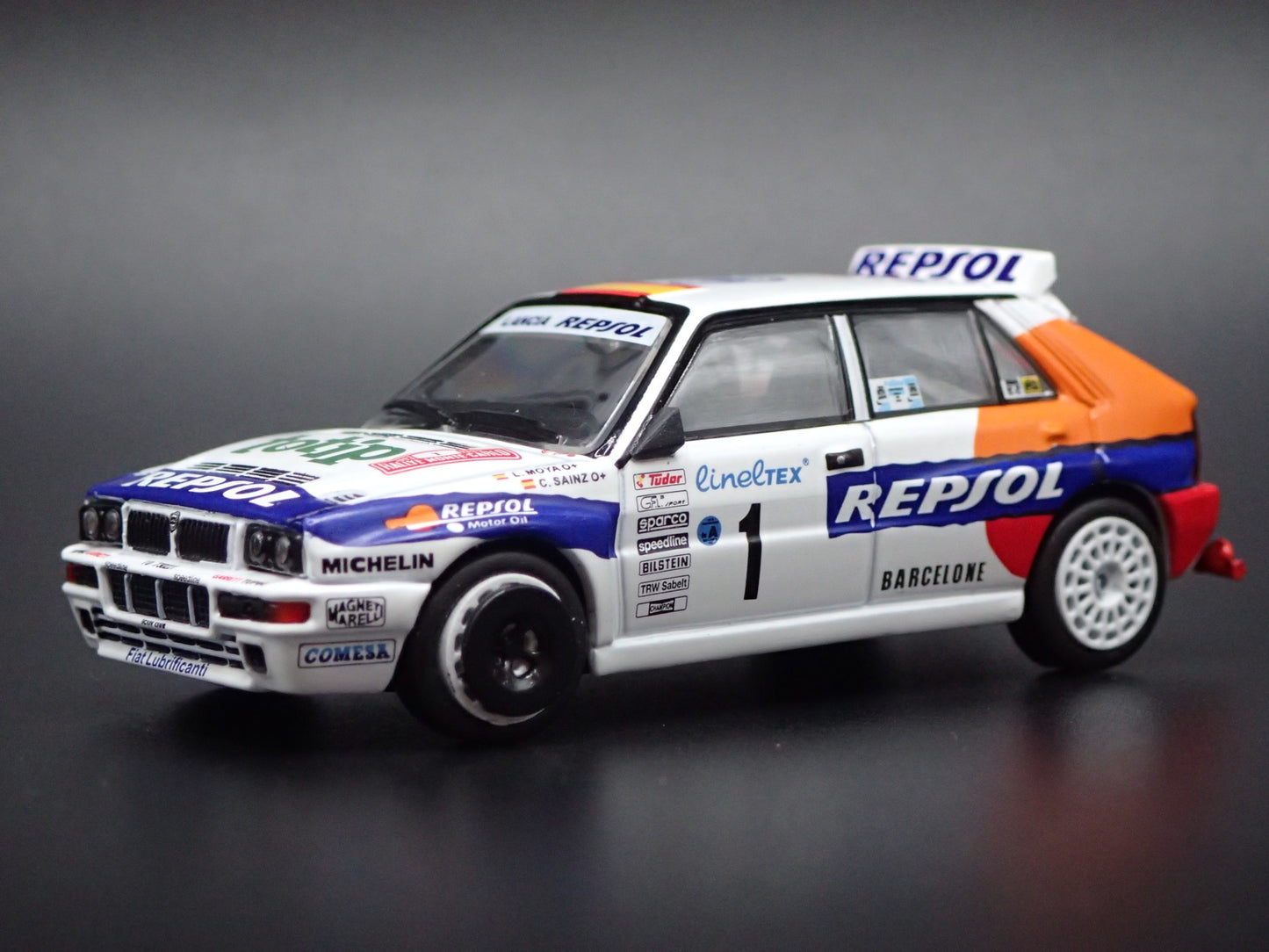 LANCIA DELTA HF INTEGRALE EVOLUZIONE #1 REPSOL RACE 1:64 SCALE DIECAST MODEL CAR