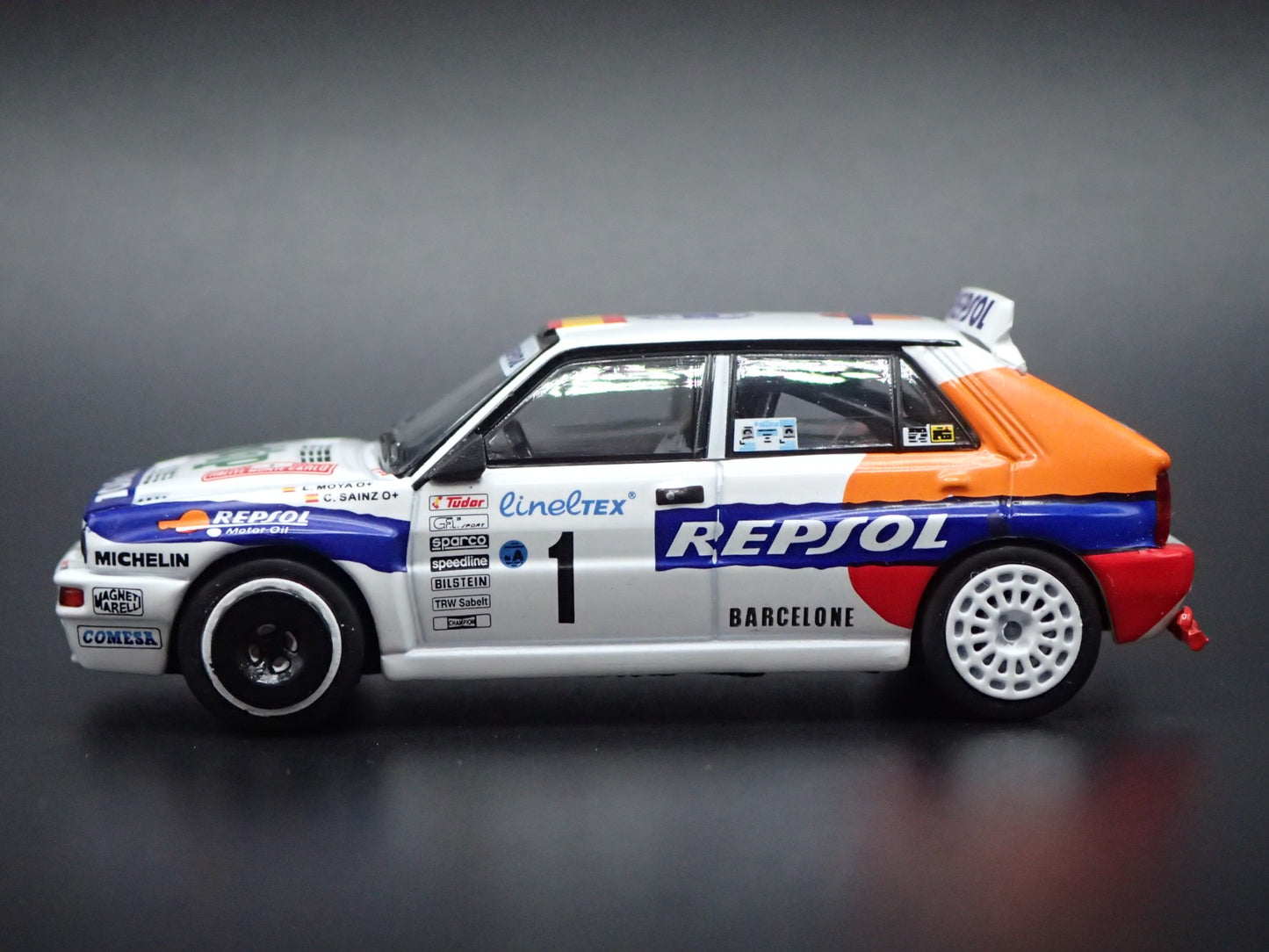 LANCIA DELTA HF INTEGRALE EVOLUZIONE #1 REPSOL RACE 1:64 SCALE DIECAST MODEL CAR