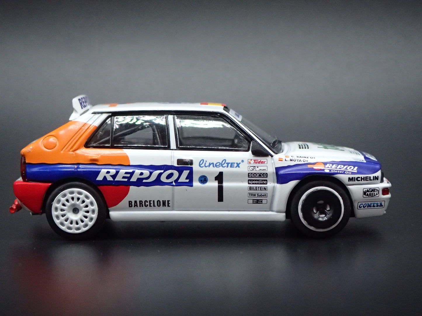 LANCIA DELTA HF INTEGRALE EVOLUZIONE #1 REPSOL RACE 1:64 SCALE DIECAST MODEL CAR